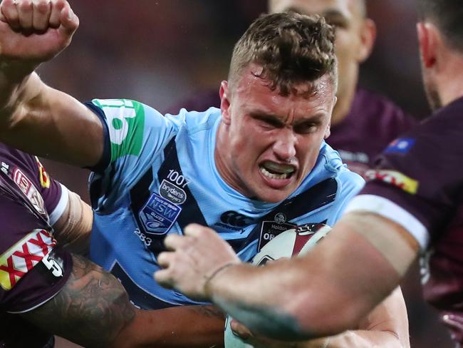 BRISBANE, AUSTRALIA - JUNE 05: Jack Wighton of the Blues is tackled during game one of the 2019 State of Origin series between the Queensland Maroons and the New South Wales Blues at Suncorp Stadium on June 05, 2019 in Brisbane, Australia. (Photo by Chris Hyde/Getty Images)