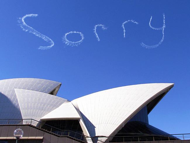 During the Corroboree 2000 celebrations, on a day where more than 150,000 people marched across the Sydney Harbour Bridge as a sign of reconciliation, the word 'sorry' appeared in the sky above the sails. Picture: Rob Griffith/AP