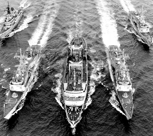 HMAS Adelaide, front left, HMAS Success, HMAS Darwin, with HMAS Brisbane, rear left, and HMAS Sydney in the Persian Gult in 1991