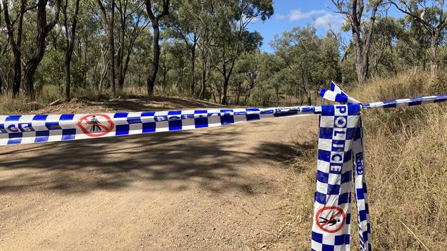 Picture of police tape sealing off Shannonvale Rd about 3km from crime scene which saw Mervyn and Maree Schwarz along with Graham Tighe shot and killed and the wounding of Ross Tighe at Bogie, Central Queensland