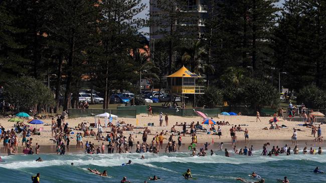 Beachgoers at Burleigh Heads on a glorious Gold Coast day. Pics Adam Head