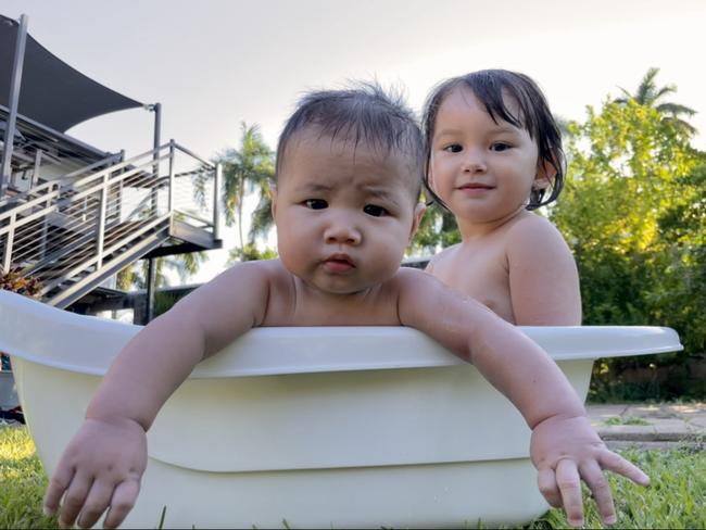 Louis Chau (6 months) and Stella Robertson (2 years old). Picture: Sarah Yuen