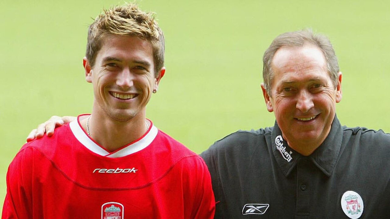 Harry Kewell signed for Liverpool and club manager Gerard Houllier (R) in June 2003.