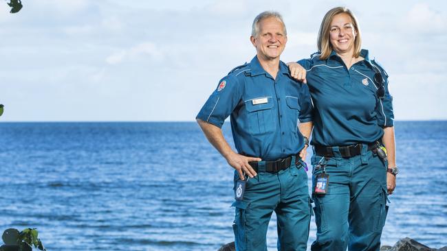 Paramedic Graeme Cooper and Patient Transport Officer Danielle Kellam at the spot where they fulfilled dying palliative patient Joyce’s wish to see and feel the ocean at Hervey Bay one last time. Photo Lachie Millard