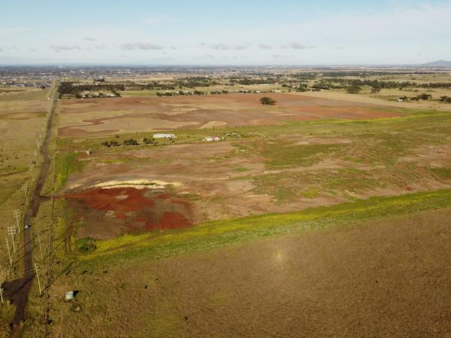 The native grasslands on the property have been completely destroyed by the asbestos contaminated fill. Picture: Adrian Marshall