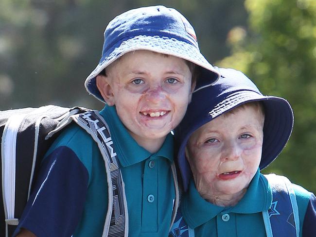 Brothers Fletcher 10 and Spencer 6 kitted out in new school uniforms ready to start the school year at Romaine Park Primary School at Burnie.