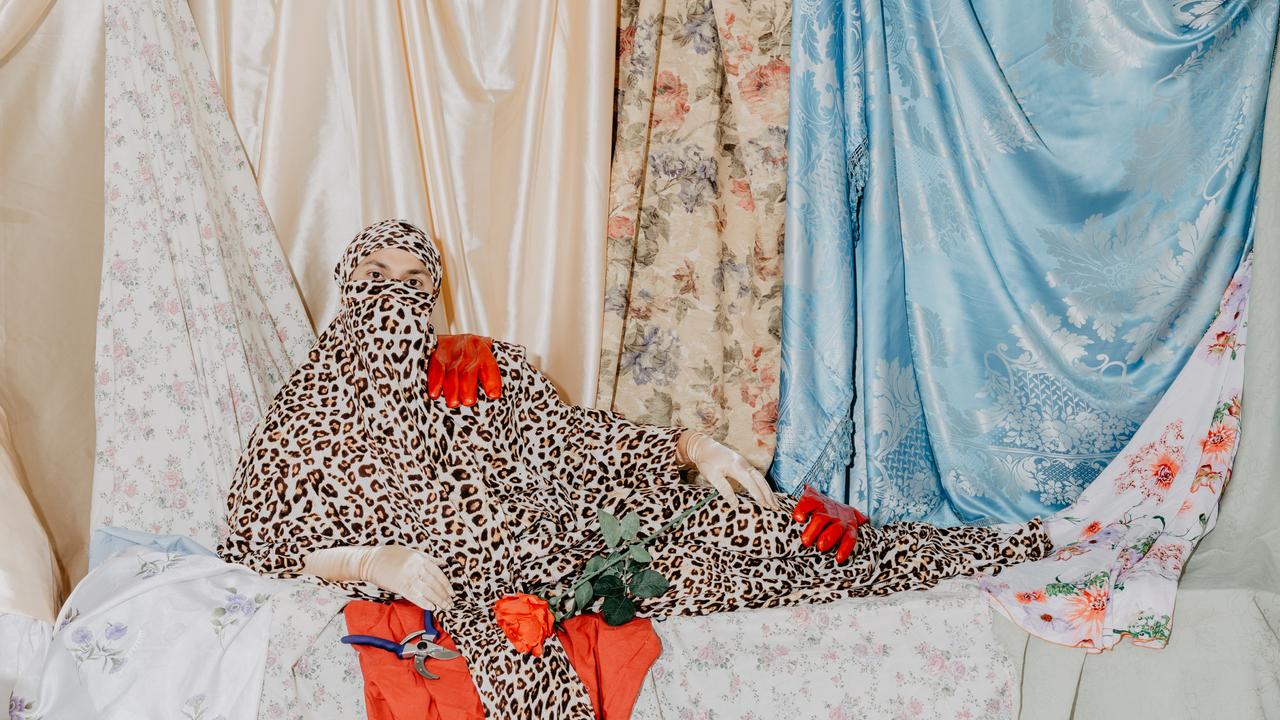 In Leopard Print. Picture: Ayman Kaake. This self-portrait is a part of a series, Beneath the Burqa, that aims to shed light on domestic violence against Arab women. The garment is inspired by the clothes worn during prayers.