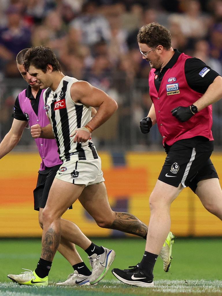 Play continued though and he had to run off the field. (Photo by Janelle St Pierre/AFL Photos via Getty Images)