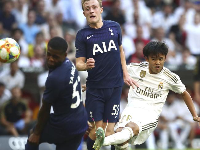 Real Madrid have just signed Japanese teenage sensation Takefusa Kubo, right, who featured against Tottenham in pre-season. Pic: AP Photo