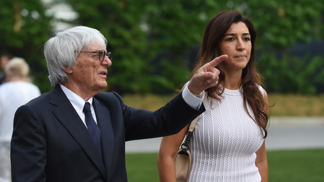 Formula One boss Bernie Eccleston with his wife Fabiana Flosi in Singapore.