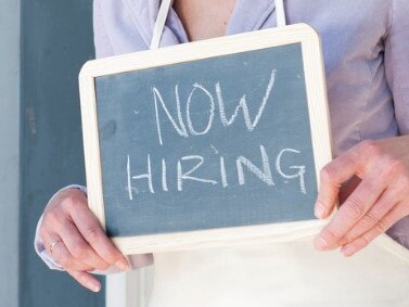 istock small business hiring sign woman