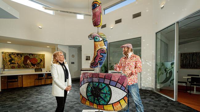 Nillumbik Council will start a feasibility study on $49 million regional art gallery. Mayor Karen Egan and artist Matt Blackwood study the work ‘Wayfarer’ by Deborah Halpern at the council offices, where many masterpieces are currently housed.