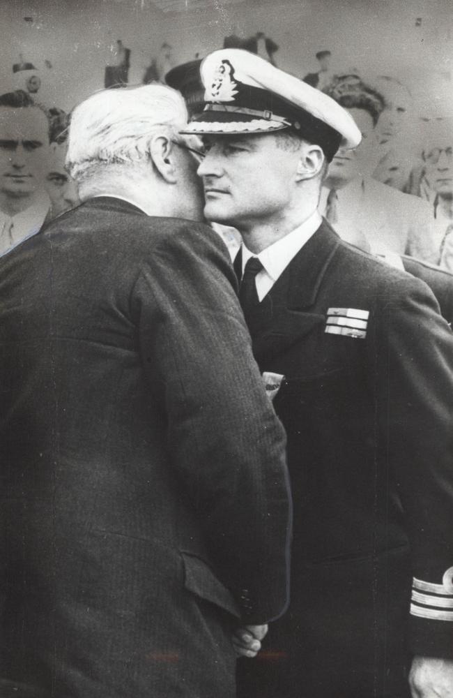 Commander Robert Ryder (right), receives his VC for gallantry at Saint-Nazaire in 1942.