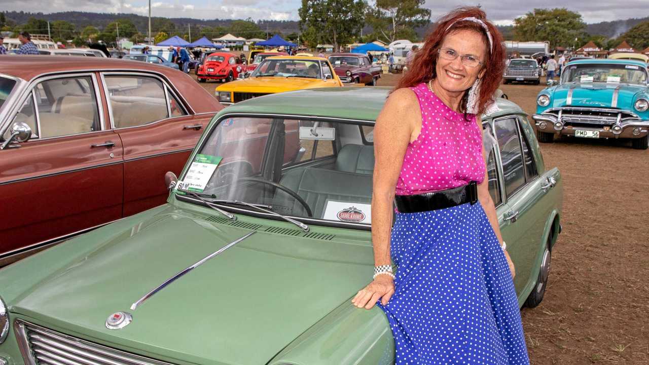 REUNION: Trisha Thompson met an old friend at the CHrome and Clutter Retro festival on the weekend - the first car she ever owned, a 1965 Morris 1100. Picture: Dominic Elsome