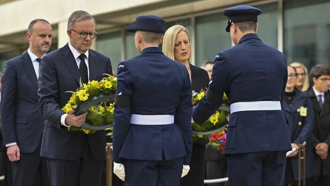 Prime Minister Anthony Albanese and Senator Katy Gallagher places a wreath at Queen's Terrace at Parliament House in Canberra. Picture: NCA NewsWire / Martin Ollman