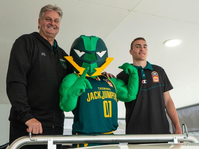 Tasmania JackJumpers coach Scott Roth, left, with team mascot Jack the Jumper and the side’s first ever player signing, Launceston’s Sejr Deans. Picture: Darren Alexander