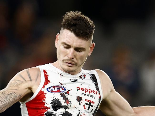 MELBOURNE, AUSTRALIA – MAY 29 Josh Battle of the Saints kicks the ball during the round 11 AFL match between the St Kilda Saints and the North Melbourne Kangaroos at Marvel Stadium on May 29, 2022 in Melbourne, Australia. (Photo by Darrian Traynor/AFL Photos/Getty Images)