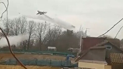 Russian fighter jets bomb a Ukrainian village.