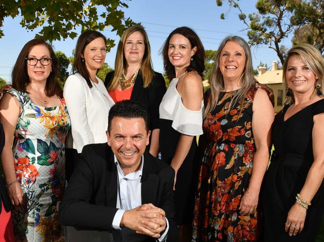 Carolyn Martin (Enfield), Karen Hockey (Davenport), Tarnia George (Seat of Ramsay), Jassmine Wood (Colton), Nick Xenophon, Kate Bickford (Badcoe), Helen Szuty (Playford) and Sonja Taylor (Taylor) pose for a photograph in Unley, Adelaide on Thursday the 25th of January 2018. The Strong Female Line-Up for the Nick Xenophon Team. (AAP/ Keryn Stevens)