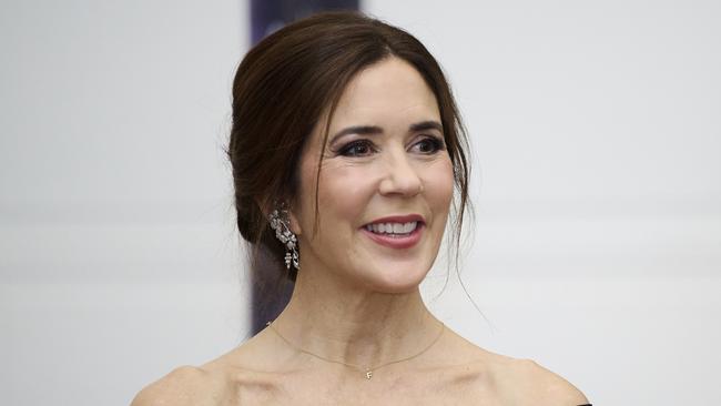 Crown Princess Mary of Denmark wears a simple necklace bearing her husband’s initial. Picture: Carlos Alvarez/Getty Images