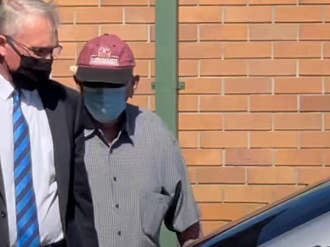 John Vincent Lewis (right) with his lawyer outside Hervey Bay District Court.