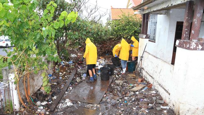 Mary Bobolas’s front yard after the clean-up removed tonnes of rubbish. Picture: Adam Taylor