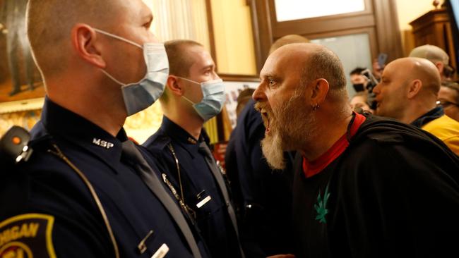 Anti-lockdown protesters flooded Michigan’s state capitol a month ago. Picture: Jeff Kowalsky/AFP