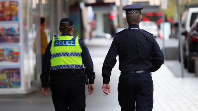 Superintendent Scott Denny walking Hindley St and North Tce. Picture: Brett Hartwig