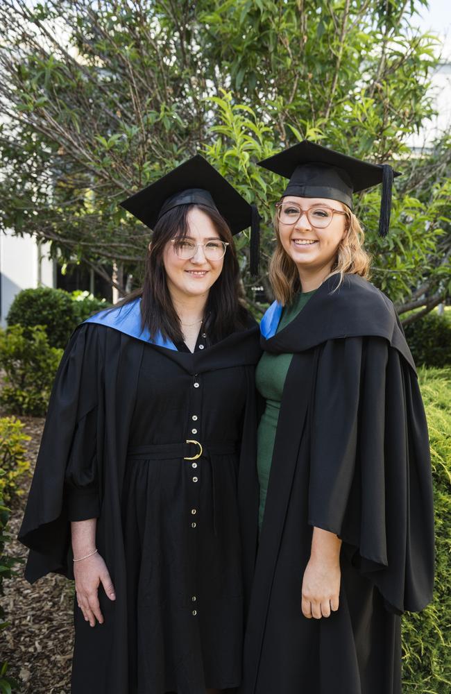 Bachelor of Nursing graduates Penny Warner (left) and Jorja Wiedman at a UniSQ graduation ceremony at Empire Theatres, Tuesday, October 31, 2023. Picture: Kevin Farmer