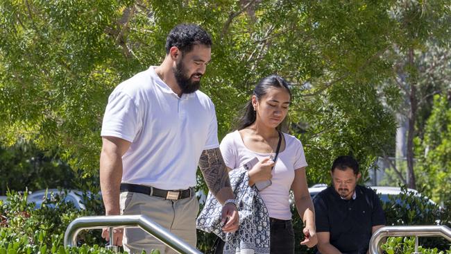 Keith Titmuss's brother Jesse Titmuss (white polo) and sister Zara Titmuss after speaking with the parents. Picture: NCA NewsWire / Simon Bullard.