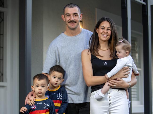 Taylor Walker with his wife Ellie and kids prior to his 250th game in June this year. Picture: Emma Brasier.