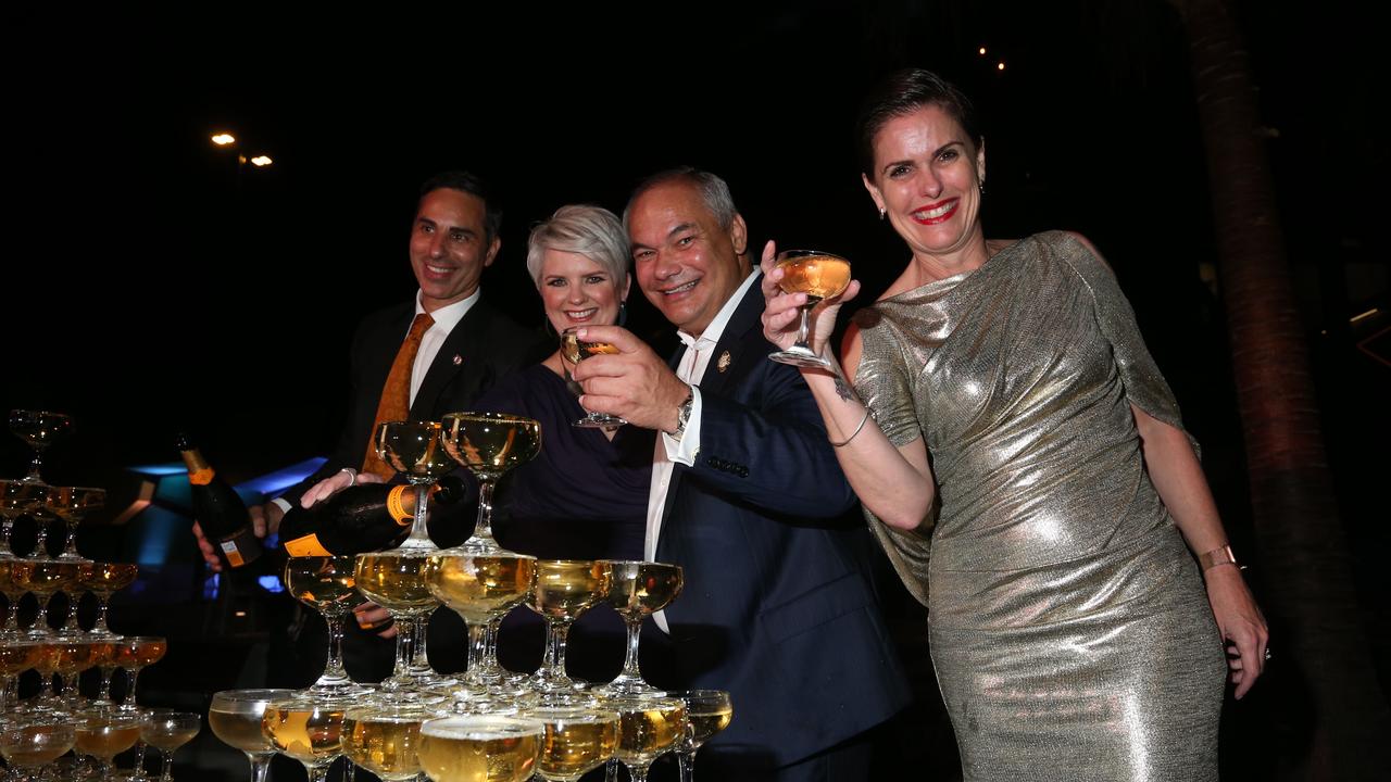 Artist Michael Zavros (left) with Mayor Tom Tate and HOTA CEO Criena Gehrke (far right) at the HOTA Gallery launch on Saturday night. Pic Mike Batterham