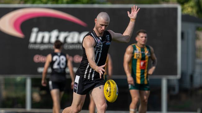 Nick Hind playing for Palmerston in the 2024-25 NTFL season. Picture: Tymunna Clements / AFLNT Media