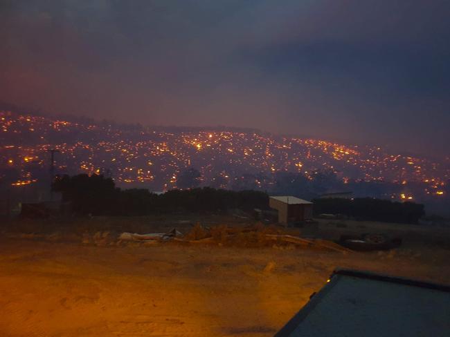 Fires burn the hills around Garrie Eyles’ property during the Pelham Rd fires. Picture: JASON EYLES