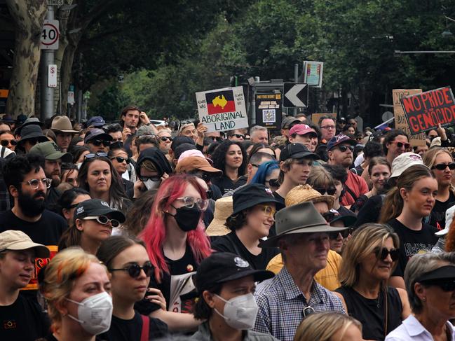 Thousands of protesters gather outside the Victorian Parliament for the Invasion Day rally Picture: Luis Enrique Ascui