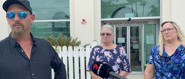 Supporters who labelled themselves as close relatives of victims Mervyn and Maree Schwarz and Graham Tighe speak to media outside Bowen courthouse after accused murderer Darryl Valroy Young appears over videolink for a mention. Picture: Janessa Ekert