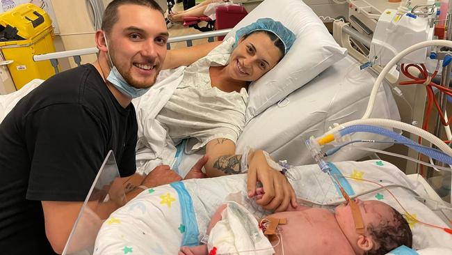 Georgia Merucci and Jackson Cook pictured with their newborn son Cole Cook. Photo - contributed.