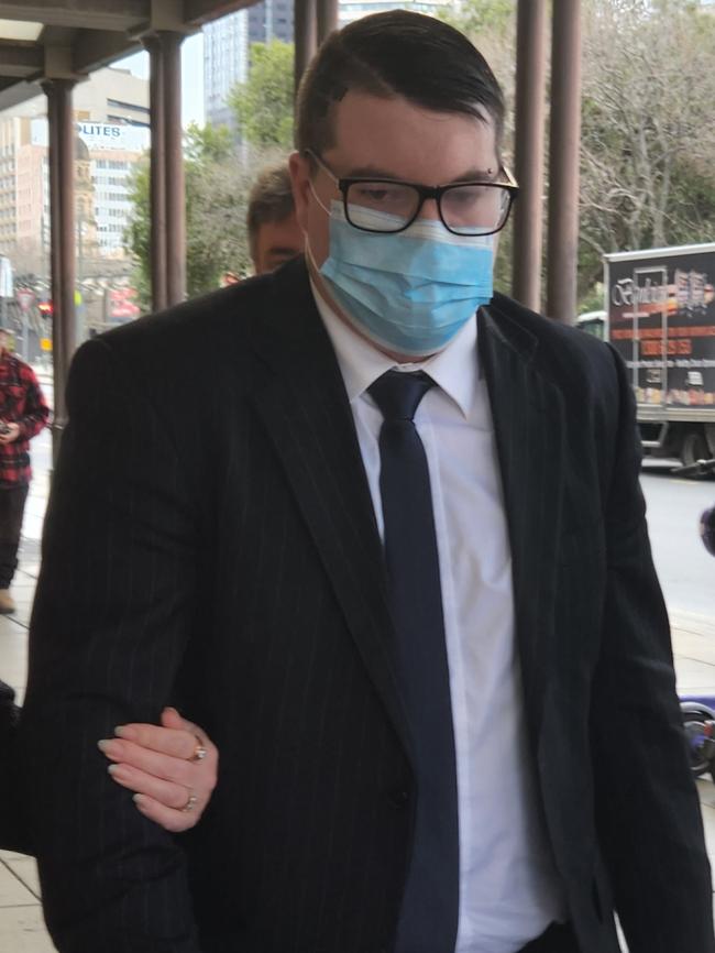 Campbell Henderson leaves the Adelaide District Court on Thursday. Photo: Lucy Rutherford