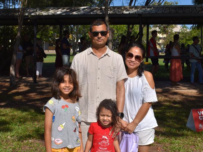 Dilli Binadi and Pratisha Deaan voting with children in tow Diya, 8 and Aavya, 3.