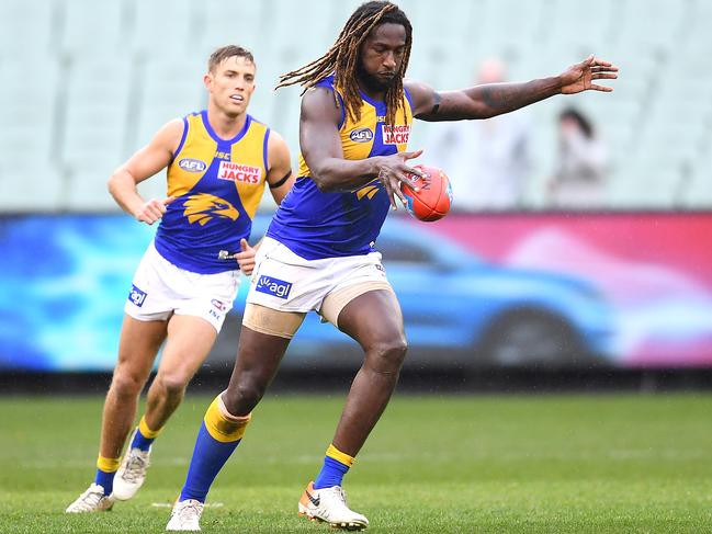 MELBOURNE, AUSTRALIA - JUNE 29: Nic Naitanui of the Eagles kicks during the round 15 AFL match between the Hawthorn Hawks and the West Coast Eagles at Melbourne Cricket Ground on June 29, 2019 in Melbourne, Australia. (Photo by Quinn Rooney/Getty Images)