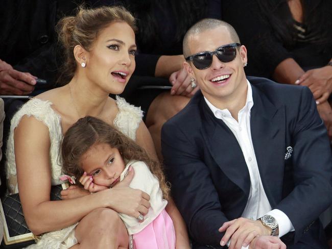 02/10/2012 WIRE: Jennifer Lopez, her boyfriend Casper Smart and her daughter Emme watch Chanel's ready to wear Spring-Summer 2013 collection, presented in Paris, Tuesday, Oct.2, 2012. (AP Photo/Thibault Camus) Pic. Ap
