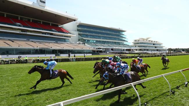 Race two is won in front of empty grandstands. Picture: Getty