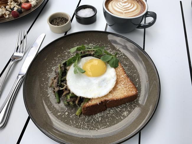 Left of Field’s fried duck egg with asparagus, mushrooms and truffle oil. Picture: Jenifer Jagielski