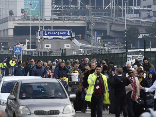 Passengers are evacuated from Brussels airport. Picture: John Thys/AFP