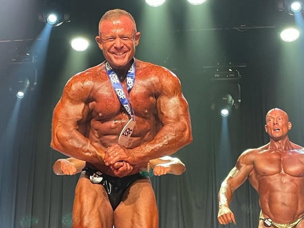 New Industrial Relations Commissioner Anthony Howell flexing muscle as a former bodybuilder. Picture: Instagram.