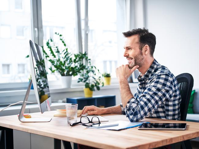 Successful freelancer working on computer while staying at home