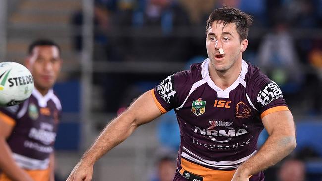 Ben Hunt of the Broncos passes during the Round 22 NRL match between the Gold Coast Titans and the Brisbane Broncos at Cbus Super Stadium in Robina on the Gold Coast, Saturday, August 5, 2017. (AAP Image/Dave Hunt) NO ARCHIVING, EDITORIAL USE ONLY