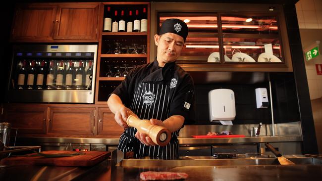 Sizzling: Teppanyaki chef Eric Chan cooks the most expensive steak in Australia — ever. Picture: Sam Ruttyn