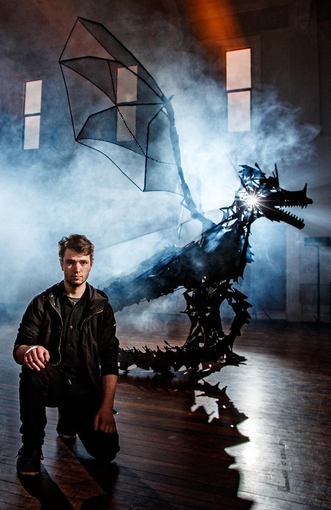 Artist Liam Davies-Brown with his giant metal dragon sculpture at the Barossa Regional Gallery as part of the SALA Festival. Picture: Matt Turner.