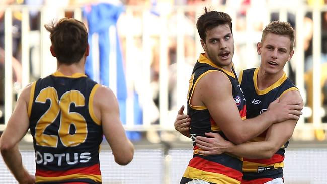 Adelaide’s Darcy Fogarty celebrates a goal with David Mackay. Picture: Paul Kane/Getty Images